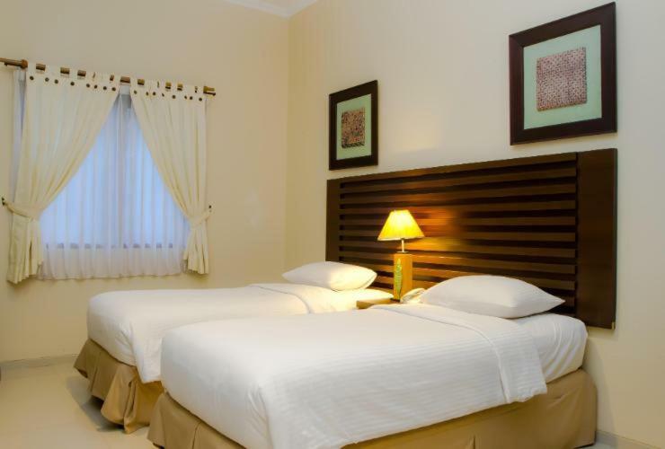 Bahamas Hotel & Resort Tanjung Pandan Exterior foto